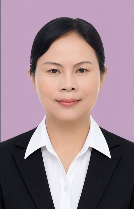 A professional headshot of Ms. Vongphachan Vongsouvan, a woman with dark hair wearing a white collared shirt and black blazer, posed against a soft purple background. The portrait serves as a formal image to accompany the official recognition of her outstanding leadership and successful educational seminar.