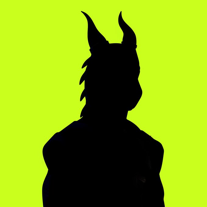 A stark black silhouette of a horned figure against a bright neon yellow-green background.