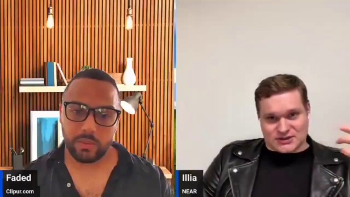 The image shows two men having a conversation over video call. One man wears glasses and has a beard, while the other man wears a leather jacket. The background features a wooden wall with shelves filled with books. The caption of the image reads "AI is moving from screens into physical homes through robotics. Once machines can see and hear everything, privacy becomes a core infrastructure problem, not a feature." This statement suggests that the conversation between the two men may be related to the impact of AI on privacy in our daily lives or how it affects the way we interact with technology.