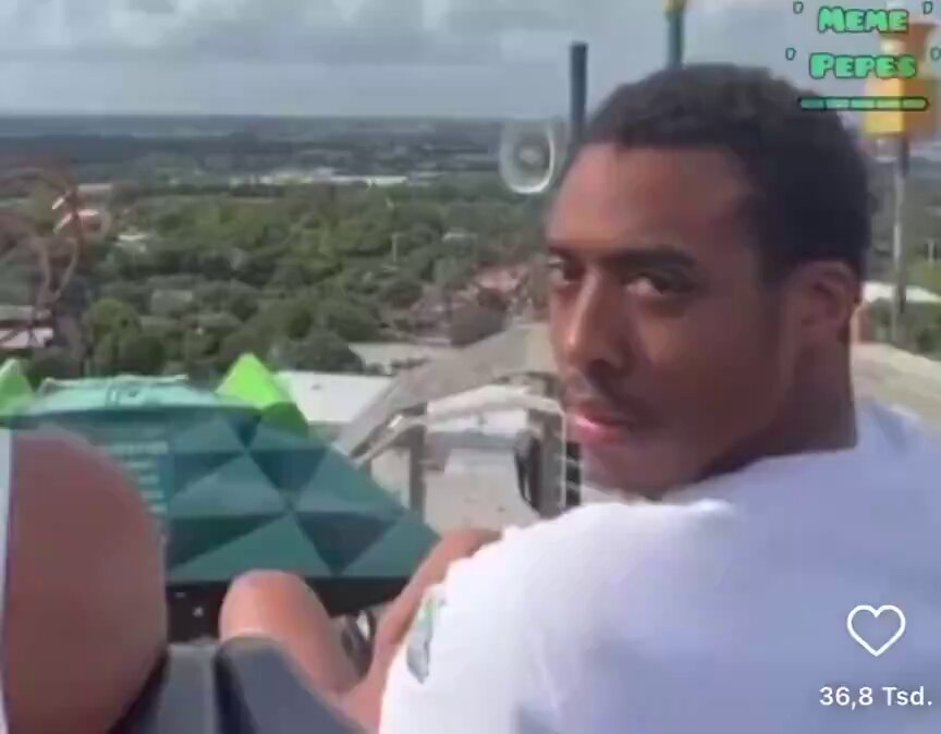 The image shows a man wearing a white shirt, sitting inside an amusement park ride with his arms around himself as he looks out over the landscape. There are also other people visible in the background of the scene. The caption for this image reads "Bitcoiners during the dip." This phrase is likely a reference to Bitcoin's recent drop in value and its popularity among younger generations, who have been using it as an investment or hobby.

The man sitting inside the ride appears to be enjoying his time at the amusement park despite the current economic climate. The image captures this moment of leisure and enjoyment amidst uncertain financial times.