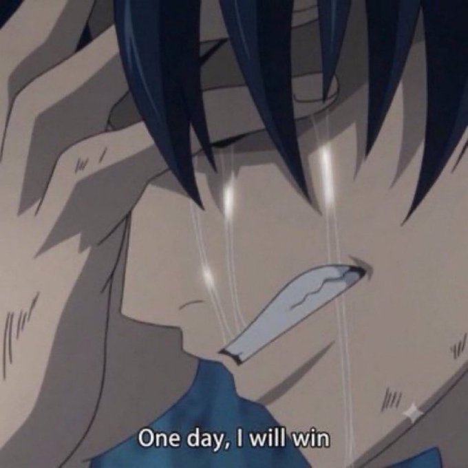 A close-up anime screenshot of a dark-haired character crying, with the subtitle 'One day, I will win' at the bottom.
