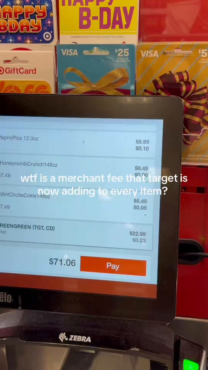 The image shows a computer screen displaying a payment system for a store, with a total of five items being added up at once. The screen also displays an error message that reads "Wtf is a merchant fee that target is every item adding to every item". This suggests that the payment system may be causing confusion or frustration among customers due to its complexity and multiple options.
