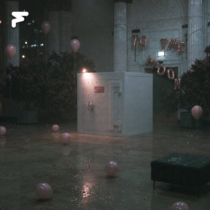A large freestanding vault sits abandoned in a dimly lit, classical building at night, surrounded by scattered pink balloons and "TO THE MOON" foil banners, with confetti littering the wet floor. The scene captures the post-celebratory aftermath of crypto exuberance—evoking the post's question about whether retail excitement has truly died or whether the real value (the locked vault) still stands amid fading hype.