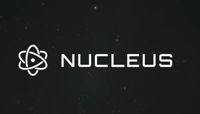 A logo for 'NUCLEUS' featuring an atom-like symbol on a dark starry background.