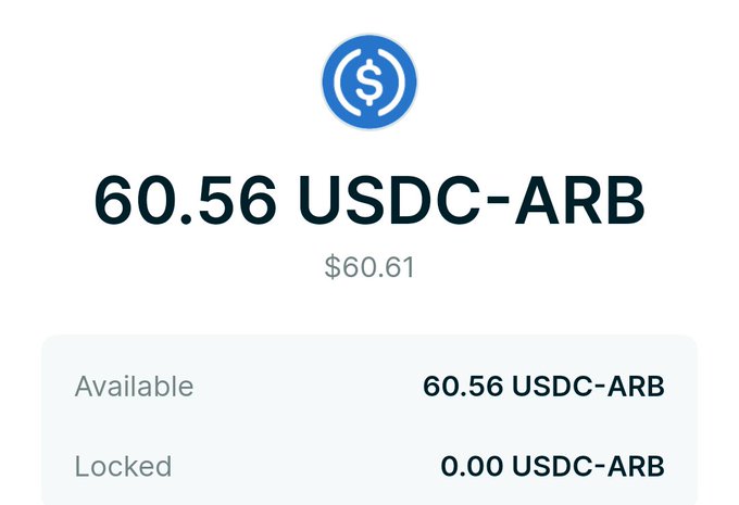 A screenshot showing a crypto wallet balance of "60.56 USDC-ARB" (valued at $60.61), with 60.56 available and 0.00 locked.