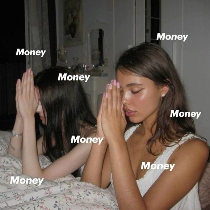Two women are shown praying with hands together, with the word "Money" repeatedly overlaid across the image.