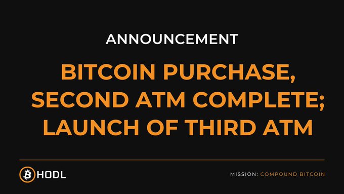 An announcement banner with orange and white text on a black background reading 'BITCOIN PURCHASE, SECOND ATM COMPLETE; LAUNCH OF THIRD ATM' from HODL with the tagline 'MISSION: COMPOUND BITCOIN'.