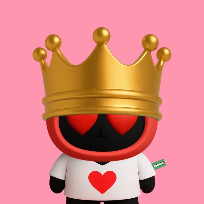 A 3D-rendered black character with red eyes wearing a gold crown and a white shirt with a red heart on it, with a green tag that says "YOUKIE" attached.