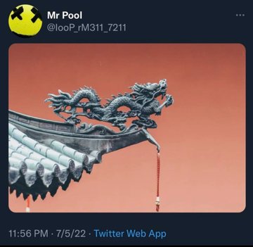 The image, posted by Twitter user @looP_rM311_7211, shows an ornate dragon sculpture perched on the corner of a traditional East Asian-style roof against a pink sky, with the caption "To the Moon!!" implying the dragon is poised for a mythical ascent or surge upward.
