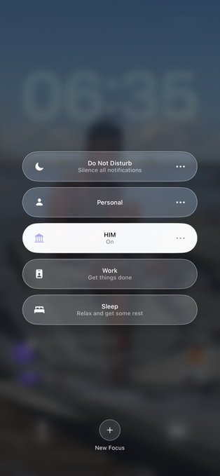 A smartphone screenshot showing an iOS Focus mode menu with options including Do Not Disturb, Personal, HIM (currently selected as 'On'), Work, and Sleep, overlaid on a blurred background showing the time 06:35.