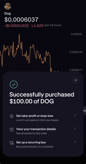 The image shows a phone screen with a message from someone named "DCA" that reads, "Did you DCA? $DOG Cost average Go get some on @krakenfx Get rewards of up to $300 Referral code: 29bssw7z Referral link: invite.kraken.com/JDNW/z5ua63jg". The message is about a trading app called "DCA" that allows users to trade Dog currency for other cryptocurrencies, and it encourages the user to refer their friends or family members who are interested in trading Dog currency.