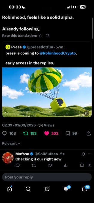 A mobile Twitter screenshot showing a post from 'Press @pressdotfun' announcing that 'press is coming to @RobinhoodCrypto' with an image of a green and yellow parachute carrying a green character.