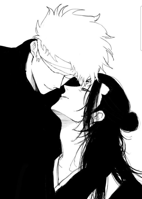 A black and white anime-style illustration of two characters, one with light hair leaning in closely towards the other with dark hair.