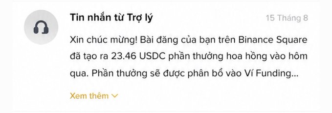 A Vietnamese Binance notification message dated August 15 stating "Xin chúc mừng! Bài đăng của bạn trên Binance Square đã tạo ra 23.46 USDC phần thưởng hoa hồng vào hôm qua. Phần thưởng sẽ được phân bổ vào Ví Funding..." (Congratulations! Your post on Binance Square generated 23.46 USDC commission reward yesterday. Reward will be distributed to Funding Wallet...).