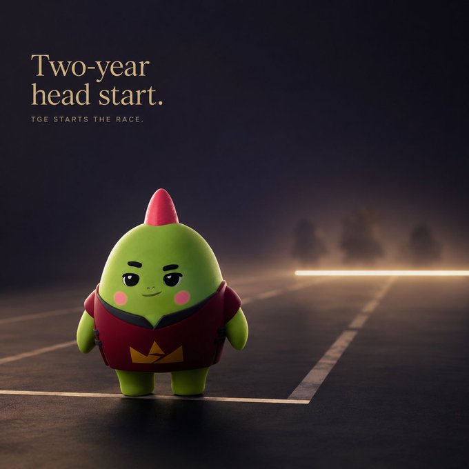 A green mascot character wearing a red shirt with a crown logo stands on a track at a starting line, with text reading 'Two-year head start. TGE STARTS THE RACE.'