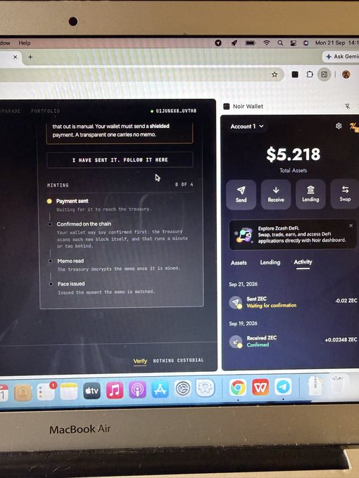 A MacBook Air screen displaying a crypto wallet interface with $5.218 in total assets and a guide explaining shielded payment transactions, with macOS dock icons visible at the bottom.