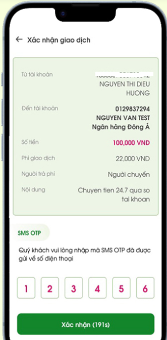 A mobile phone screenshot of a transaction confirmation screen in Vietnamese, showing a transfer of 100,000 VND from NGUYEN THI DIEU HUONG to NGUYEN VAN TEST, with an SMS OTP entry field.