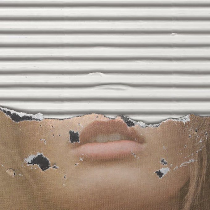 A torn, partially ripped poster showing only a woman's mouth visible beneath horizontal blinds, with the eyes covered by the poster's damaged edge.