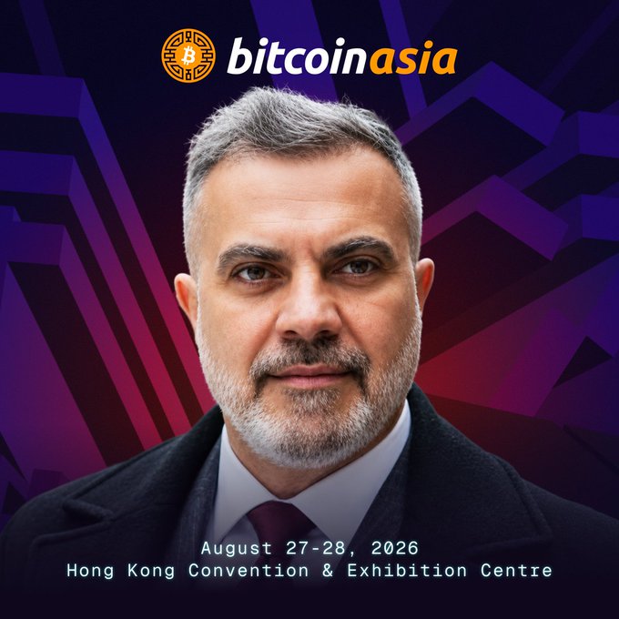 A promotional graphic for Bitcoin Asia 2026 features a headshot of Giovanni Santostasi, Director of the Scientific Bitcoin Institute, displayed against a purple geometric background with the event logo and details "August 27-28, 2026, Hong Kong Convention & Exhibition Centre," directly tying to the post announcing his speaking engagement at the conference.