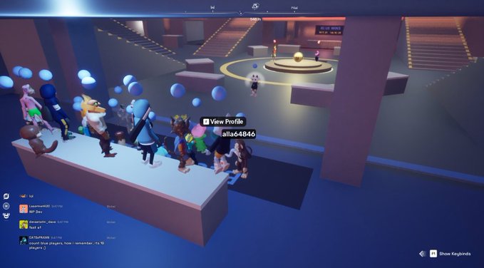 Screenshot of a virtual 3D game environment (Blue Kingdoms) showing various player avatars gathered on platforms with chat visible on the left side.