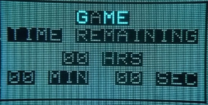 A digital display screen with pixelated text reads 'GAME TIME REMAINING 00 HRS 00 MIN 00 SEC.'