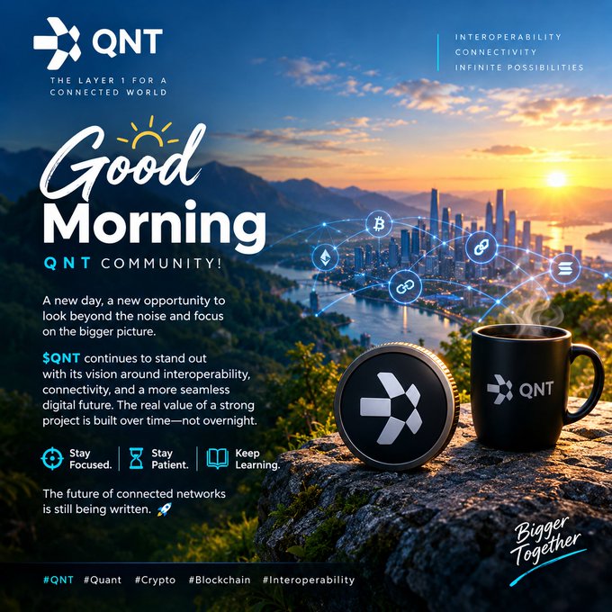 Promotional graphic for QNT ($QNT) cryptocurrency with 'Good Morning QNT Community!' text, showing a cityscape with blockchain network nodes, a QNT coin, and a coffee mug against a sunrise mountain backdrop.