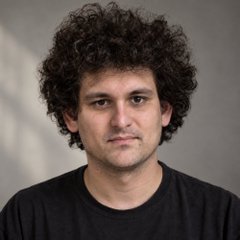 The image shows a man with dark curly hair wearing a black t-shirt, photographed against a light gray background. Based on the accompanying post, this is Sam Bankman-Fried, who is pictured as he seeks to appeal his FTX fraud conviction and the $11B forfeiture order.