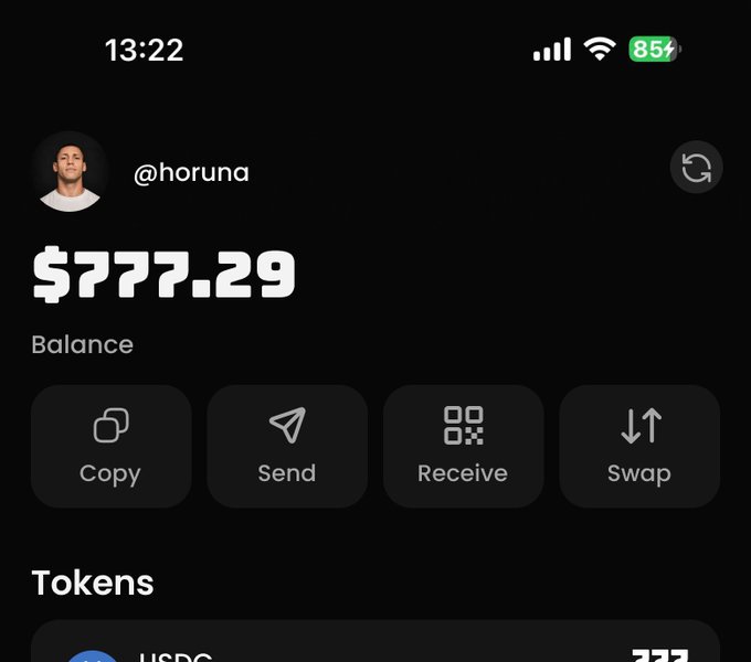A cryptocurrency wallet app screenshot showing user @horuna with a balance of $777.29 and navigation buttons for Copy, Send, Receive, and Swap, with USDC visible in the tokens list.