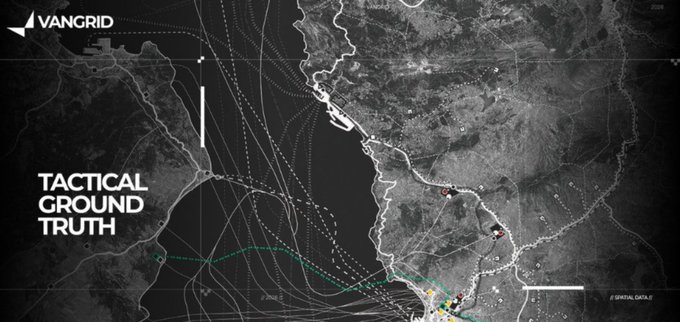 A grayscale tactical map branded with the 'VANGRID' logo displays 'TACTICAL GROUND TRUTH' with shipping lanes and vessels visible in a coastal region.