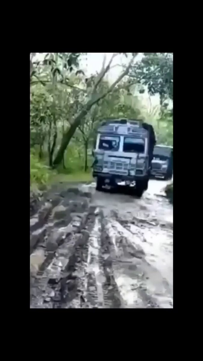 The image shows a large truck driving down a muddy road, surrounded by trees. The truck appears to be making a turn or changing lanes as it navigates through the challenging terrain. In the background, there are two other vehicles - one on the left side of the frame and another further back in the scene. The post accompanying this image is titled "Snowflakes abandoning ship as soon as it gets turbulent." This phrase could be interpreted as a metaphor for the truck's struggle to maintain control or stability while driving through the muddy road, which may also imply that the truck might have encountered some difficulties during its journey.

The image seems to be related to an advertisement or promotional material, possibly for a company selling trucks or offering services related to vehicle maintenance and repair. The presence of trees in the background suggests that this scene takes place in a rural or natural setting, which could further support the idea that the truck is being advertised.
