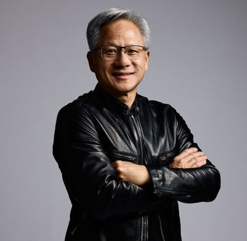 A confident man with silver hair and glasses stands with arms crossed, wearing a black leather jacket. The image, likely depicting Jensen Huang, Nvidia's CEO, visually reinforces the company's expansion of its AI toolkit for chip design and autonomous engineering.
