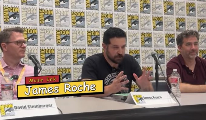 A panel discussion at San Diego Comic-Con featuring James Roche of Muse Ink (center) alongside David Steinberger (left) and another panelist (right).