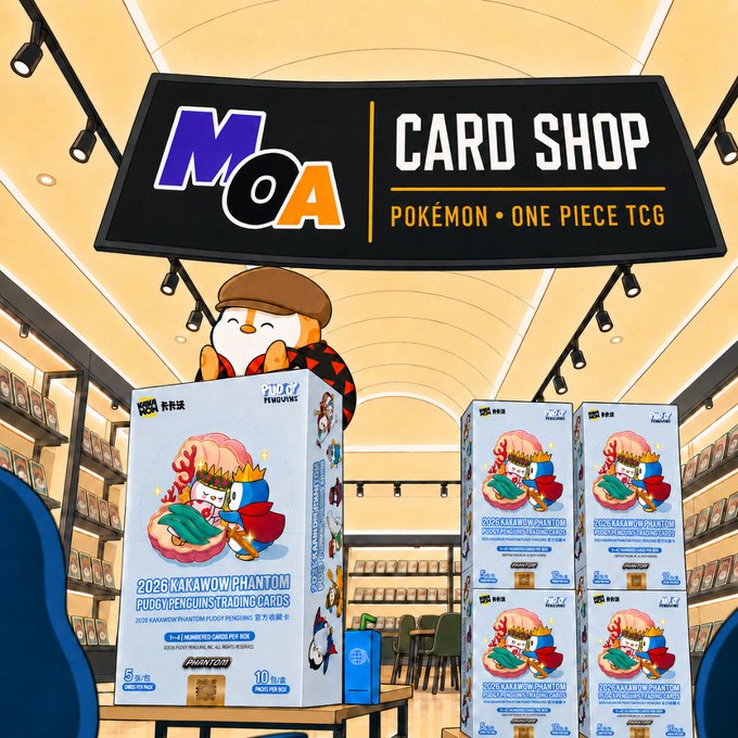 A brightly lit store interior with a sign reading 'MoA CARD SHOP POKÉMON • ONE PIECE TCG', displaying stacked boxes of '2026 KAKAWOW PHANTOM PUDGY PENGUIN TRADING CARDS' featuring a character with a skull mask and hat.