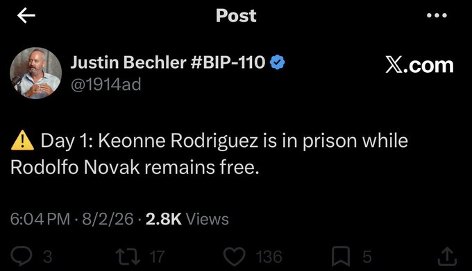 A screenshot of an X (formerly Twitter) post by Justin Bechler @1914ad stating 'Day 1: Keonne Rodriguez is in prison while Rodolfo Novak remains free,' dated 8/2/26.