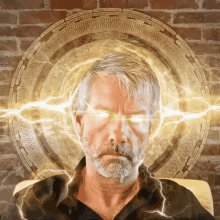 The image features a man with a beard wearing a black shirt, sitting against a brick wall. He has a serious expression on his face as he looks directly at the camera. The background of the image includes a circular pattern that appears to be made up of lines and dots, giving it an artistic or abstract appearance. There is also text in the image that reads "Tax loss harvest your old Bitcoin before buying way more fresh Bitcoin". This message seems to be related to Bitcoin trading or investing, possibly suggesting that the man should consider selling his existing Bitcoins for tax purposes or invest in new Bitcoins as a speculative move.

The combination of the serious expression on the man's face and the abstract background creates an intriguing atmosphere in the image. The text "Tax loss harvest your old Bitcoin before buying way more fresh Bitcoin" adds a layer of depth to the scene, possibly hinting at the man's financial situation or investment goals.