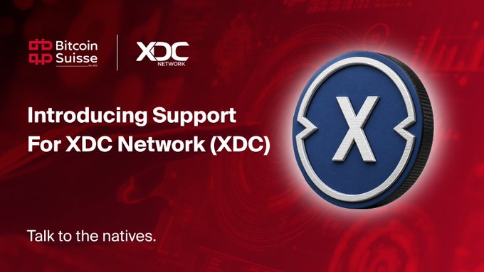 A Bitcoin Suisse announcement graphic reading 'Introducing Support For XDC Network (XDC)' with the tagline 'Talk to the natives' next to a large XDC coin logo.