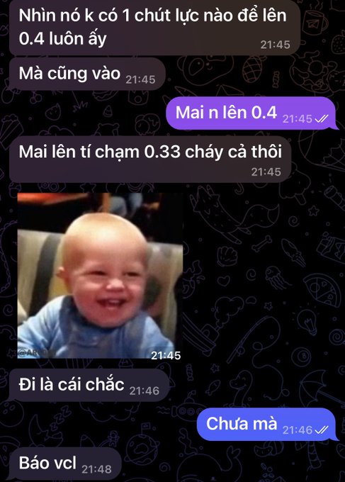 A Vietnamese-language chat conversation with messages discussing reaching 0.4, with a meme image of a laughing baby and replies 'Chưa mà' and 'Bảo vcl'.