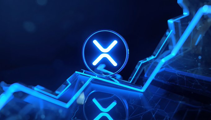 Glowing blue 3D rendering of an XRP (XRP) cryptocurrency coin with its 'X' logo, mounted on a futuristic angular structure with circuit-like pathways.