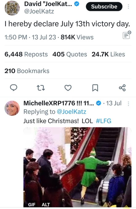 A tweet from David "JoelKatz" (@JoelKatz) reading "I hereby declare July 13th victory day," with a reply from MichelleXRP1776 comparing it to Christmas with a GIF of someone celebrating on an escalator.