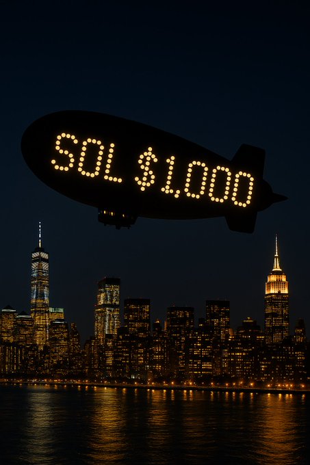A night view of the New York City skyline featuring a large blimp in the sky displaying 'SOLD $1,000' in illuminated letters.