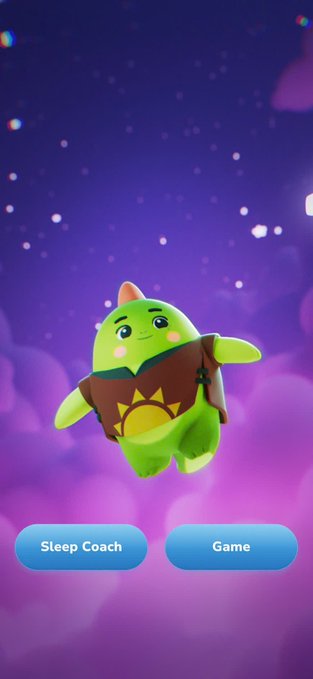 A mobile app screen displays a cute green mascot character wearing a brown sun-patterned outfit floating against a purple starry sky, with "Sleep Coach" and "Game" buttons at the bottom.