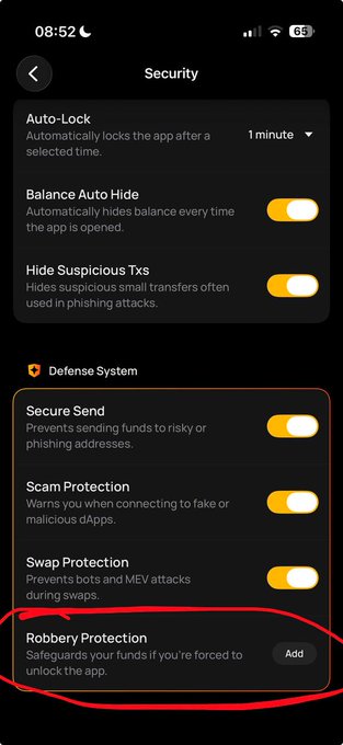 A screenshot of a Security settings menu showing features like Auto-Lock, Balance Auto Hide, Hide Suspicious Txs, and Defense System options including Secure Send, Scam Protection, Swap Protection, and Robbery Protection (circled in red), illustrating advanced software-based wallet protections as an alternative to hardware wallets criticized in the post.