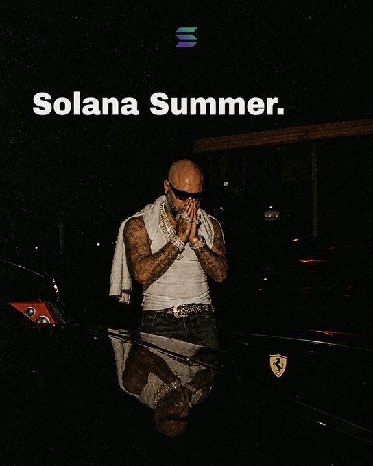 iced coffee with a foam top, white frothy milk, and a silver spoon rests on a black surface, accompanied by the text "SOLANA SUMMER."