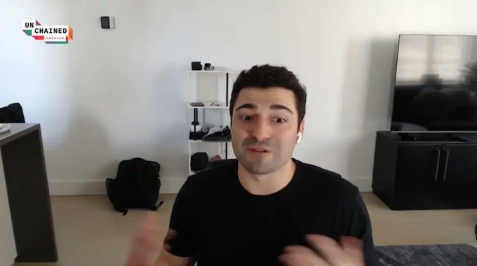 The image shows Justin Blau, co-founder of Dripstack.xyz, speaking during an Unchained Premium interview, with the "UNCHAINED Premium" logo visible in the upper left corner of the frame. He appears to be explaining how Dripstack enables AI agents to pay content creators in stablecoins for paywalled articles on a per-use basis, a discussion highlighted by the post mentioning 4,300 articles purchased and over $300 paid to writers in just one month.