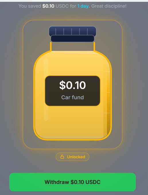A savings app screen showing a yellow jar labeled '$0.10 Car fund' with the message 'You saved $0.10 USDC for 1 day. Great discipline!' and a green 'Withdraw $0.10 USDC' button at the bottom.