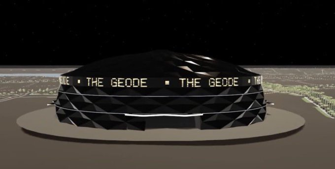 A dark, geometric building structure labeled 'THE GEODE' set against a night sky with city lights visible in the background.