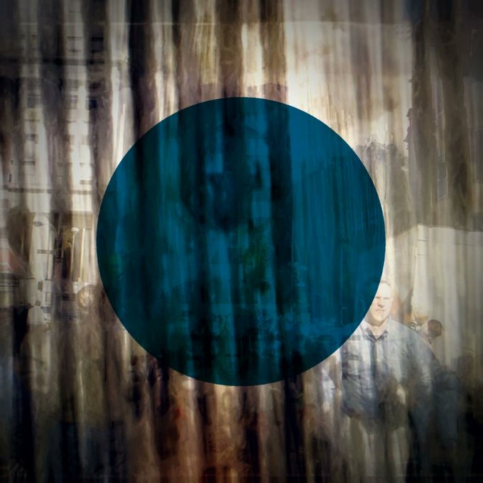 An abstract painting with a large blue circular shape set against a blurred, streaky background featuring a faintly visible man in a gray shirt and tie.