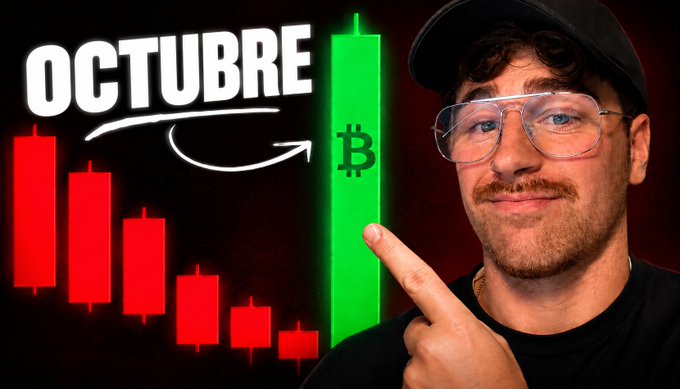 A man with glasses points at a Bitcoin graphic, with red declining candlesticks and a large green rising one, labeled 'OCTUBRE'.