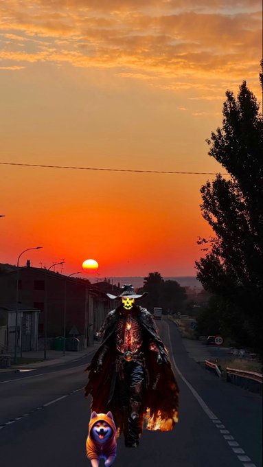 A fantasy figure with glowing yellow eyes and fiery elements on their clothing walks down a road at sunset, accompanied by a dog.
