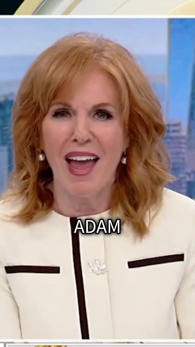 The image features a woman wearing a white jacket, smiling at the camera while talking about Bitcoin. The caption of the image reads "No, it' s not me." This suggests that someone else might be responsible for the Bitcoin mystery or the post on Fox Business.